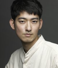 憲 輝